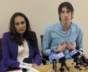 James Damore, right, a former Google engineer fired in 2017 after writing a memo about the biological differences between men and women, speaks at a news conference while his attorney, Harmeet Dhillon, listens, Monday, Jan. 8, 2018, in San Francisco.