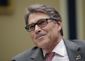 Energy Secretary Rick Perry listens to a statement by Energy and Commerce Committee Chairman Greg Walden, R-Ore., during a hearing about the electrical grid, on Capitol Hill in Washington, Thursday, Oct. 12, 2017.  (AP Photo/J. Scott Applewhite)