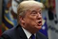 U.S. President Donald Trump speaks during a meeting with Republican members of the Senate about immigration in the ...