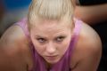 Dandenong Ranger Kiera Rowe leans into a team huddle during a time-out earlier this year. 