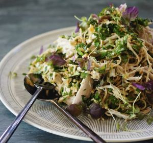 Poached chicken and soba noodle salad with chunky nut Sriracha dressing.