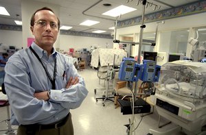 Dr. Dick David, a neonatologist, stands in a neonatal care unit Wednesday, April 7, 2004, at Chicago's John H. Stroger Jr. Hospital of Cook County