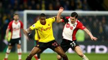 Watford's Marvin Zeegelaar, left, and Southampton's Pierre-Emile Hojbjerg battle for the ball during the English Premier ...