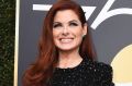 Debra Messing called out E! live on E! for failing to pay their male and female stars equally.