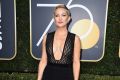 Kate Hudson arrives at the 75th annual Golden Globe Awards at the Beverly Hilton Hotel.