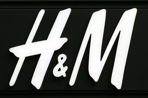 The logo of H & M Hennes & Mauritz AB, a Swedish multinational clothing-retail company is pictured on the Champs Elysees Avenue in Paris, France, Wednesday, Sept. 20, 2017.