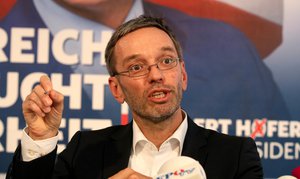 File - Herbert Kickl Secretary General of Austria's Freedom Party, FPOE, speaks to the press during the presentation of the election posters of Norbert Hofer, candidate for presidential elections of Austria's right-wing Freedom Party ,in Vienna, Austria, Wednesday, Aug. 24, 2016.