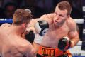 Big hit: Jeff Horn retains his world title against Gary Corcoran in Brisbane.