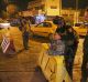 Iraqi security forces working at the scene of a suicide bombing in Baghdad.