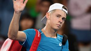 Alex de Minaur acknowledges the crowd as he leaves the court.