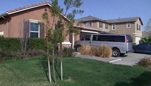 In this grab taken from video provided by KABC-TV on Tuesday, Jan. 16, 2018, the exterior of the home where police arrested a couple accused of holding their 13 children captive, in Perris, east of Los Angeles.