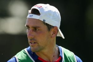 Low-key debut: Mitchell Pearce (right) takes time out at Knights training with teammate Trent Hodkinson.