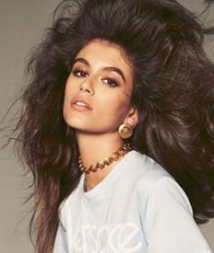 Kaia Gerber, seen here modelling for Versace, is designing a capsule collection with Karl Lagerfeld.