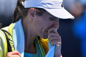 A disappointed Johanna Konta leaves the court.