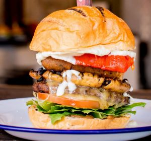 A towering burger at Soul Burger.