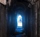 People can be seen standing on the Israeli side of the border with Gaza, from an opening in the tunnel dug by the ...