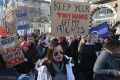 Demonstrators take part in the Women's March on London last year.