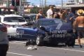 The aftermath of the multi-car crash at a major Gold Coast intersection on Friday.