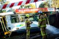 Emergency crews clean up after a collision between a tram and a truck in Parkville in May last year.