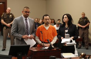 Dr. Larry Nassar, 54, appears in court for a plea hearing in Lansing, Mich., Wednesday, Nov. 22, 2017.