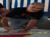 Donato Romito (1954-2018), painting a banner during the St. Imier, Switzerland, anarchist conference, August 2012