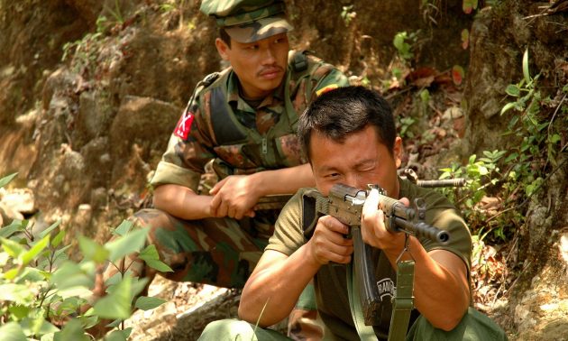 Rebel soldiers of the Kachin Independence Army (KIA) manning rifles on a supply route from Laiza, a KIA-controlled stronghold in Myanmar's northern Kachin state on the border with China. Photo: AFP/Patrick Bodenham