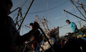 Migrant fishery workers at a port in Mahachai, on the outskirts of Bangkok in a June 30, 2015 file photo. Photo: AFP/ Nicolas Asfouri