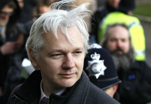 FILE - In this Feb. 1, 2012 file photo, Julian Assange, the 40-year-old WikiLeaks founder, arrives at the Supreme Court in London.