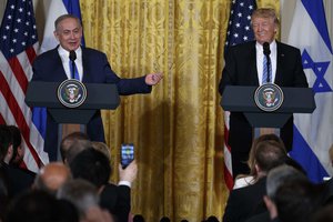 In this Wednesday, Feb. 15, 2017 file photos, President Donald Trump listens as Israeli Prime Minister Benjamin Netanyahu speaks during their joint news conference in the East Room of the White House, in Washington.