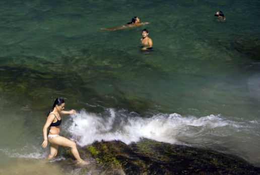 The shore, with a slightly cooler breeze blowing in from the ocean, is the only place many of them can cool off.