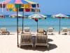 Sun Loungers On An Idyllic Empty Beach In Phuket, Thailand