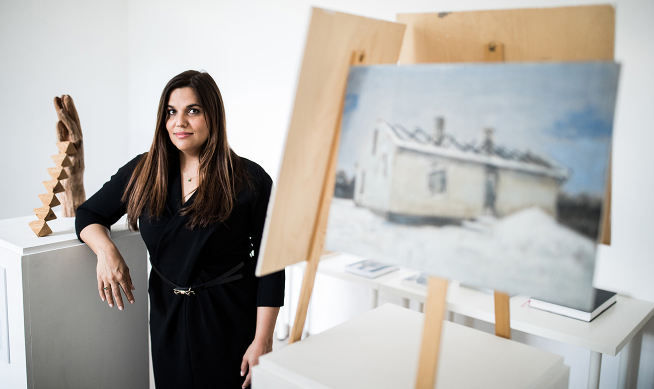 Woman standing in an art gallery