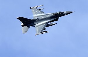 In this photo taken Wednesday, April 8, 2015, a U.S. military fighter jet participates in a NATO Baltic Air Policing Mission practice mission in the Tapa training area, some 70 kilometers (43 miles) southwest of Tallinn, Estonia.