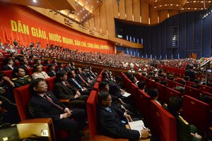 Delegates listen to speeches during the opening ceremony of the Communist Party of Vietnam's 12th Congress in Hanoi, Vietnam Thursday, Jan. 21, 2016.