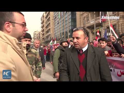 Thousands in Syria's Aleppo celebrate one year since liberation