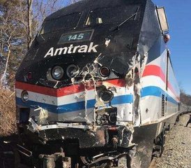 This photo provided by Rep. Jeff Denham shows the damage to the front of a train after crashing into a garbage truck in Crozet, Va., on Wednesday, Jan. 31, 2018.