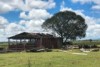 Farm shed missing panels and roofing