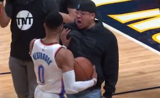 Westbrook confronts the fan on the court.