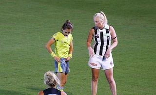 Sarah D'Arcy of the Magpies gets reported.