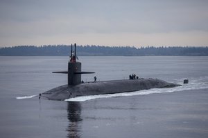 File - The Ohio-class ballistic missile submarine USS Pennsylvania transits the Hood Canal as the boat returns to its homeport at Naval Base Kitsap-Bangor, Wash., Dec. 27, 2017, following a routine strategic deterrent patrol.