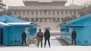 Soldiers stand guard at the Joint Security Areabetween North and South Korea. The JSA was created in 1953 as a neutral ...