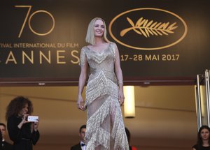 Actress and jury member Uma Thurman poses for photographers upon arrival at the award ceremony at the 70th international film festival, Cannes, southern France, Sunday, May 28, 2017.