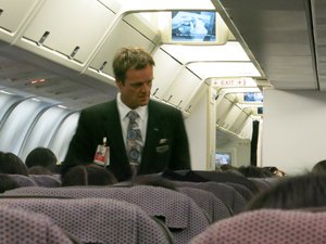 A flight attendant on Qantas Airlines