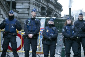 A police convoy carrying Salah Abdeslam and other members of the trial arrives under police guard at the Brussels Justice Palace in Brussels on Monday, Feb. 5, 2018. Salah Abdeslam and Soufiane Ayari face trial for taking part in a shooting incident in Vorst, Belgium on March 15, 2016.