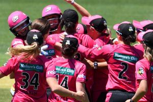 Title moment: The Sydney Sixers celebrate winning after the final of the Women's Big Bash League.