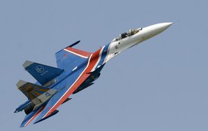 In this Saturday, May 26, 2007 file photo, a Sukhoi Su-27 fighter jet of the Russian air force elite aerobatic team Russkiye Vityazi (Russian Knights) makes a low pass during an air show in Rostov-on-Don, Russia