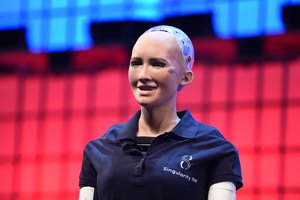 Sophia the Robot, Chief Humanoid, Hanson Robotics & SingularityNET,speaks on the Center Stage during the opening day of Web Summit 2017 at Altice Arena in Lisbon,7 November 2017