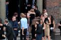 Family and friends at Jessica Falkholt's funeral. 