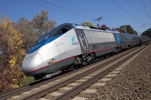 In this Oct. 18, 2016, file photo, an Amtrak Acela train travels through Old Lyme, Conn.