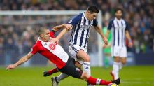 Southampton's Wesley Hoedt, left, and West Bromwich Albion's Gareth Barry in action during their English Premier League ...